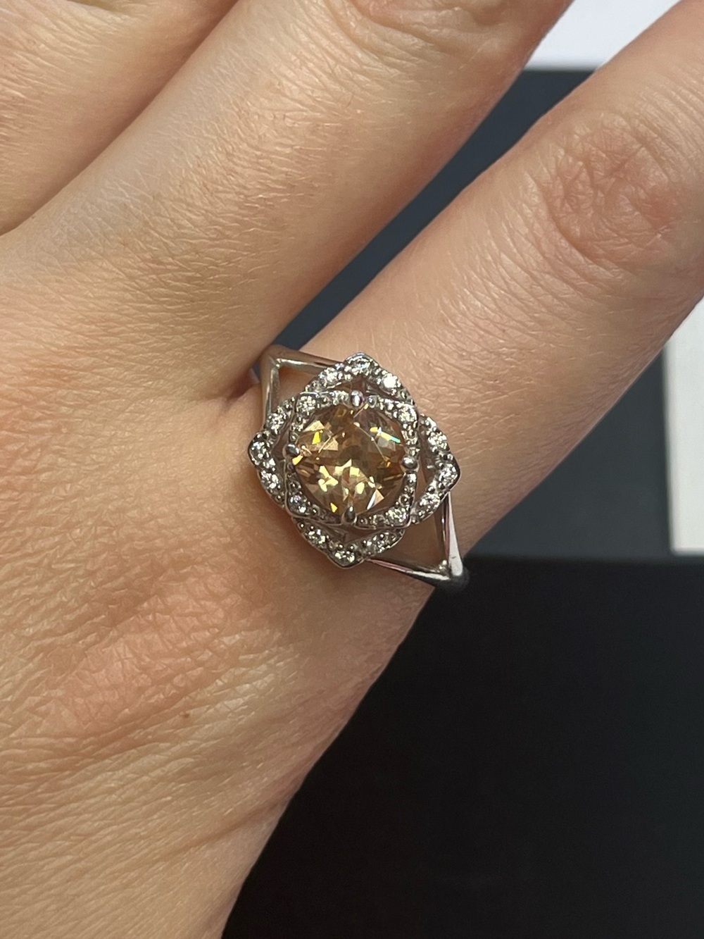 Sterling silver ring with peach orange stone. Stamped 925